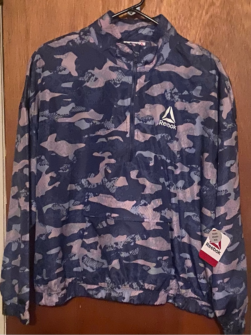 Reebok Women’s Navy and Light Pink Camo Quarter-Zip Pullover